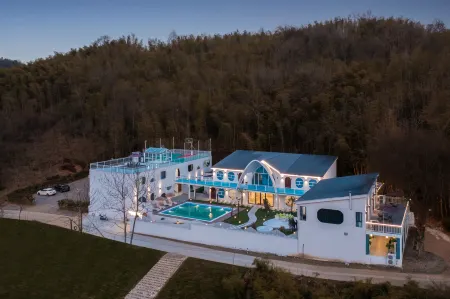 Nanshan Sanshi · Sicily Camping Homestay Отели рядом с достопримечательностью «Pingqiao Stone Dam»