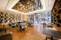 Mandollan Plus Hotel Heshan Xinhuacheng - breakfast