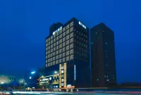 โรงแรมโมฟาง (สถานีรถไฟหนิงป่อ วิทยาลัยธุรกิจและเทคโนโลยี)