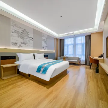 Muxi Hotel (Lanxi Baolong Plaza Store)