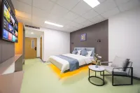 Meihekou Huju Hotel - parking