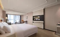 Vienna International Hotel(Zhoukou Wanguo Car World Store)