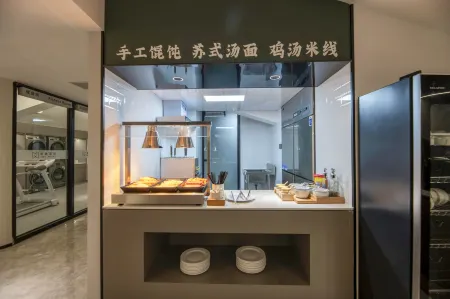 Gemei Hotel (Guannan County Renmin Road Branch) Отели рядом с достопримечательностью «Er'langshen Culture Relics Park»