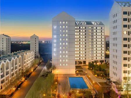 V. Hotel Отели рядом с достопримечательностью «Aranya Library»