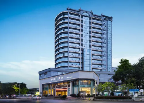 Dilunting International Hotel (Wansheng Yaocheng) Отели рядом с достопримечательностью «Nantong Mining Industry Company Workers Culture & Sport Center»