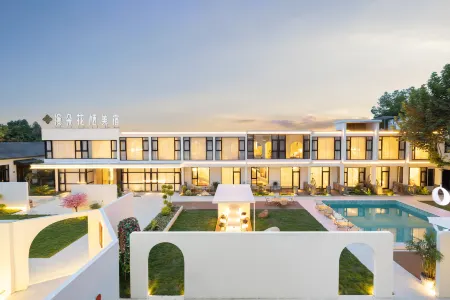 Hengdian Manduo Huaqi Meishu (Hengdian World Studios Pedestrian Street Store) Отели рядом с достопримечательностью «New Garden of Eternal Spring (Summer Garden)»