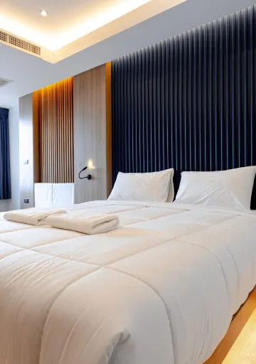 ห้องดีลักซ์ เตียงใหญ่ 1 เตียง