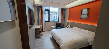 Qianyuan Hotel, Luxi Отели в г. Луси