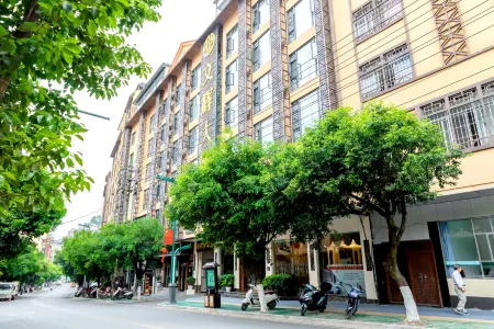 Green Spring Wenhui Hotel Отели в г. Lvchun