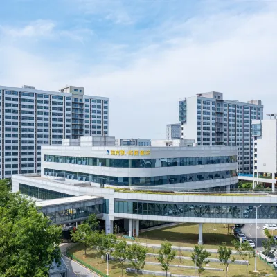 New Beacon Shangju Hotel (TCL Huaxing) Hotels near Zuoling Railway Station