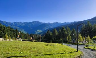 Trip.com Group Country Retreats (Womeiju Jiuzhai Forest Earth-house Joint Resort)