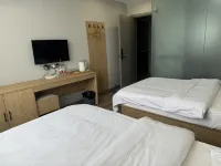 Qinghua Business Hotel