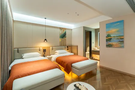 QIAN XUN HOTEL Отели рядом с достопримечательностью «Zhang Zhongjing Memorial Temple»