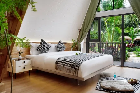 Olive Homestay in Jinghong, Xishuangbanna (located in the Dai Ethnic Minority Park Scenic Area) Отели рядом с достопримечательностью «Menghanman Tingfota Temple»