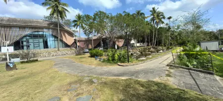 Baoting Jinyue Homestay Hotel Отели рядом с достопримечательностью «Bing Lang Gu»