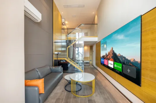 Baizhou Hotel (Zhongchuang International Ganzhou Vientiane City Store) فنادق في 