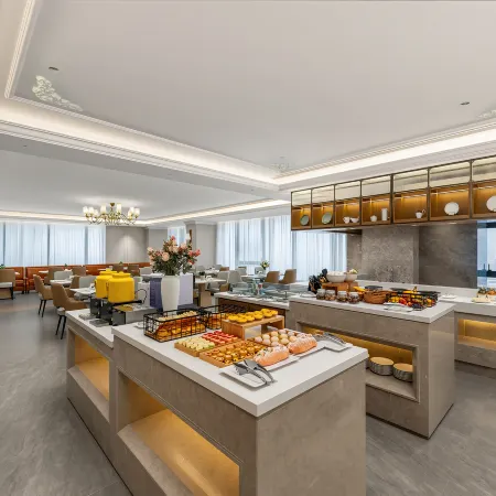 Vienna International Hotel (Heze Shan Development Zone Shunshi Building)
