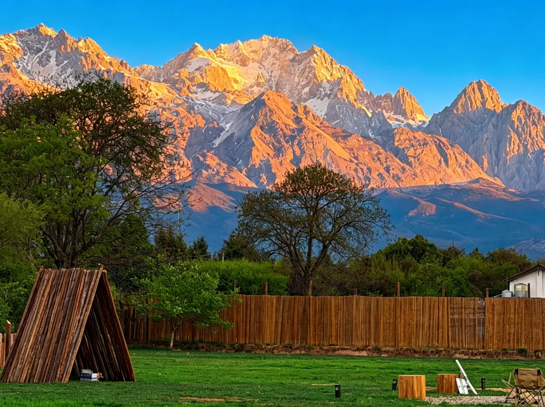 Shangheli · Golden Light Over Snowy Peaks Wild Luxury Mountain Resort - Lijiang