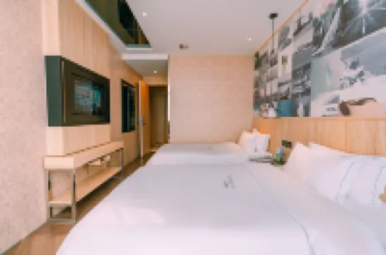 Qingmu Chain Hotel (Ma'an Shandong Railway Station Hongxing Meikailong RT-Mart)
