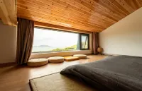Four Islands Haitang B&B - بار