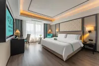 Xana Hotelle Hotel (Qionghai Zhengfu Railway Station)