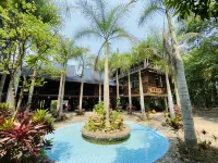 Chunmo Inn (Yizuyuan) โรงแรมใกล้สวนไทลื้อ สิบสองปันนา