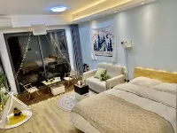 Shiyun Xiaozhan Apartment (Jiangmen Station Xinhui Darongcheng)