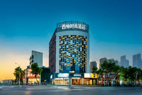 Xiqiao Fashion Hotel (Nanyang Fuyu Xintian 360 Shop)