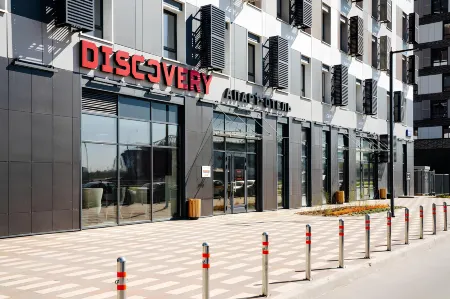 Апарт-отель Discovery Отели рядом с достопримечательностью «Самый высокий цилиндрический аквариум в мире»