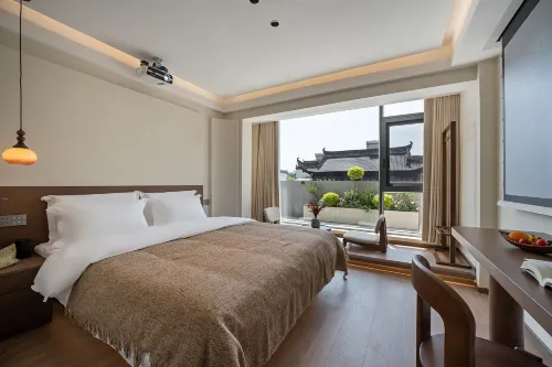 Floral Hotel·Jiuduo Hotel(Wuyuan Xiangao Ancient City Branch) - Homestays