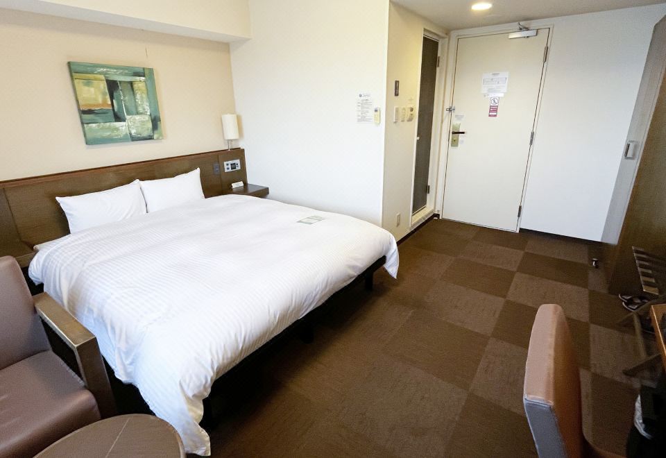 호텔 루트 인 히코네의 편안한 휴식 공간 또는 객실