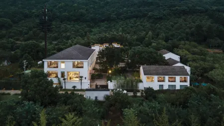 Taimei Xuelv Guesthouse Отели рядом с достопримечательностью «Shanghai Customs College Suzhou Branch»