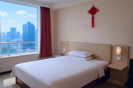 Jinniu Business Hotel (Jiangyou Station Huopao Street) Отели рядом с достопримечательностью «Buddha Cave Cave»