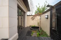 Linyi Taohuaguiyu Homestay - Hot Springs