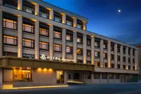 Baiyulan Hotel (Donggang Huanghai Grand Market Branch) Hotels near Zhang Island