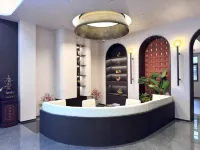 Xinglin Design Hotel (Luliang Jinhui Commercial City)