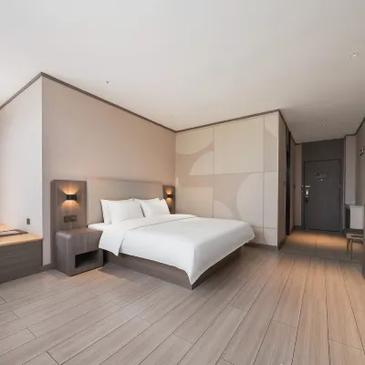 โรงแรม HanTing (สถานีรถไฟ ฮุนชุน) โรงแรมใกล้มหาวิทยาลัยหยางเป่ย