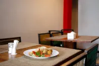 Monoloog Hotel Palembang - servizio colazione