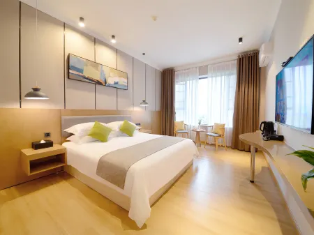 Q+ Shicheng Zuguoshun Hotel (Shicheng County Bus Station) Отели в г. Шичен