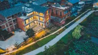 Puzhehei Yixi Yixia Homestay - Morgenmad