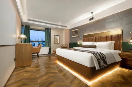 James Joyce Coffetel Apartment (Changde Wanda Plaza Wenli College) Отели рядом с достопримечательностью «Hunan University of Arts and Science (East to Changjiashan Community Health Service Station)»