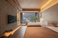 Taolu·Guanshan Listening Designer Yeshe Meisu (Shennongjia Muyu Town Bus Terminal Store) Hotel di Shennongjia