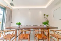 Xinmi Zhonglitaxun Homestay - Nouto- ja jättöpalvelut