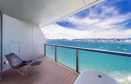 Wuchuan Le King Resort Apartment Отели в г. Учуань