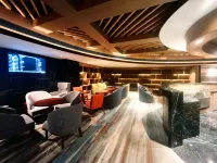 Qingdao Jiaodong Airport Flying Guest Hotel Overnight Rest Area Inn - bar
