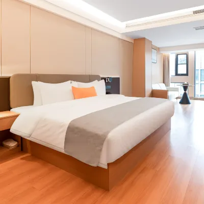 Ming Qian Ju Hotel Hotel dekat Kota Kuno Luodai