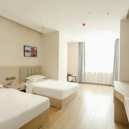 Pengxin Business Hotel (Kuqa Pedestrian Street)