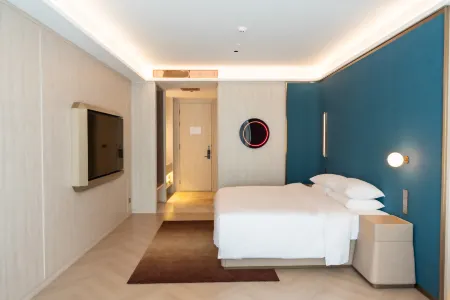 NEBULA CAEST HOLIDAY HOTEL Отели рядом с достопримечательностью «Inner Mongolia Technical College of Mechanics & Electrics»