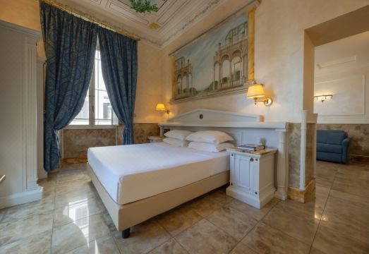 호텔 팰러디움 팰리스의 아늑한 객실