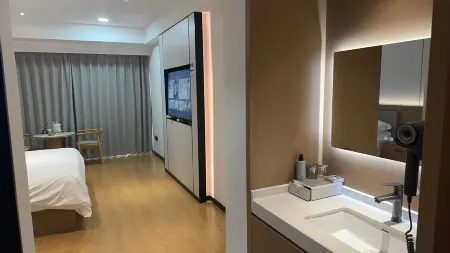 Mingzhuge Hotel (Dafang Jiaxin Moore City Branch)